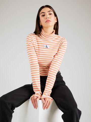 Calvin Klein Jeans Paita värissä oranssi: edessä