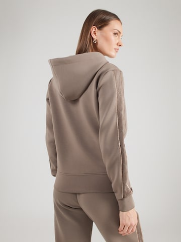 GUESS - Sudadera con cremallera en marrón