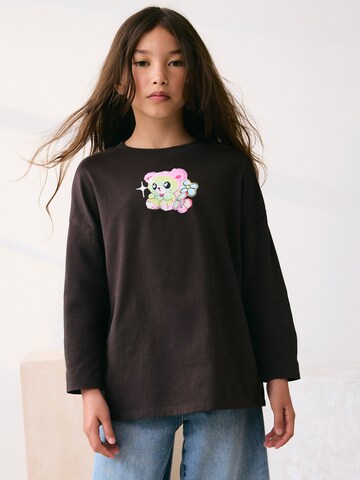 Next Shirt in Grau: Vorderseite