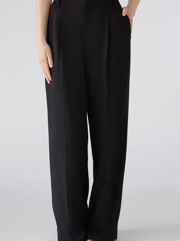 OUI Loosefit Bundfaltenhose in Schwarz