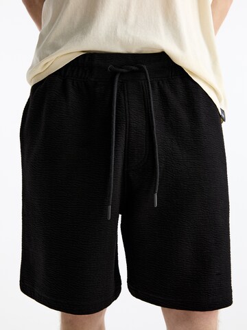 Largi Pantaloni de la Pull&Bear pe negru
