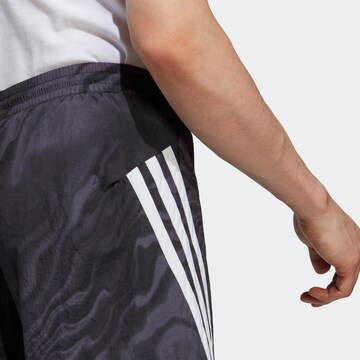 ADIDAS SPORTSWEAR regular Παντελόνι φόρμας 'Future Icons Allover Print' σε μαύρο