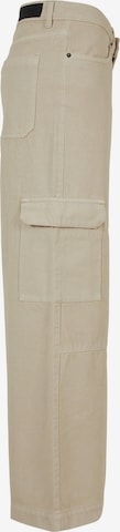 Loosefit Jeans cargo di Urban Classics in beige