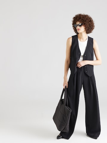 ABOUT YOU x Iconic by Tatiana Kucharova Loose fit Pleat-Front Pants 'Mathilda' in Black