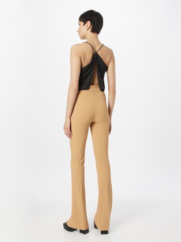 Elisabetta Franchi Rozkloszowany krój Spodnie w kolorze brązowy