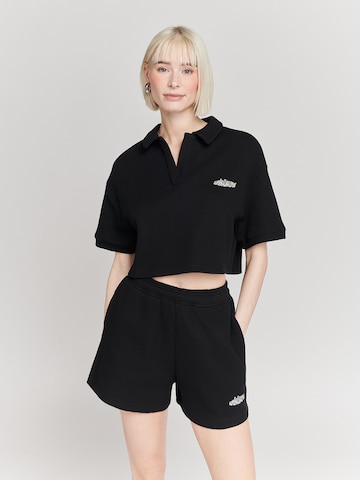 UNFOLLOWED x ABOUT YOU Shirt 'EXPLORE' in Black: front