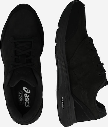 Chaussure de course 'Odyssey' ASICS en noir