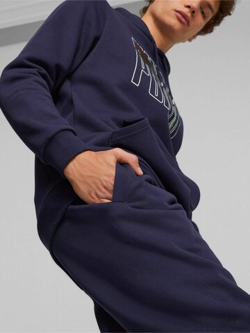 regular Pantaloni sportivi 'Puma Ess Logo Lab Sweatpant' di PUMA in blu