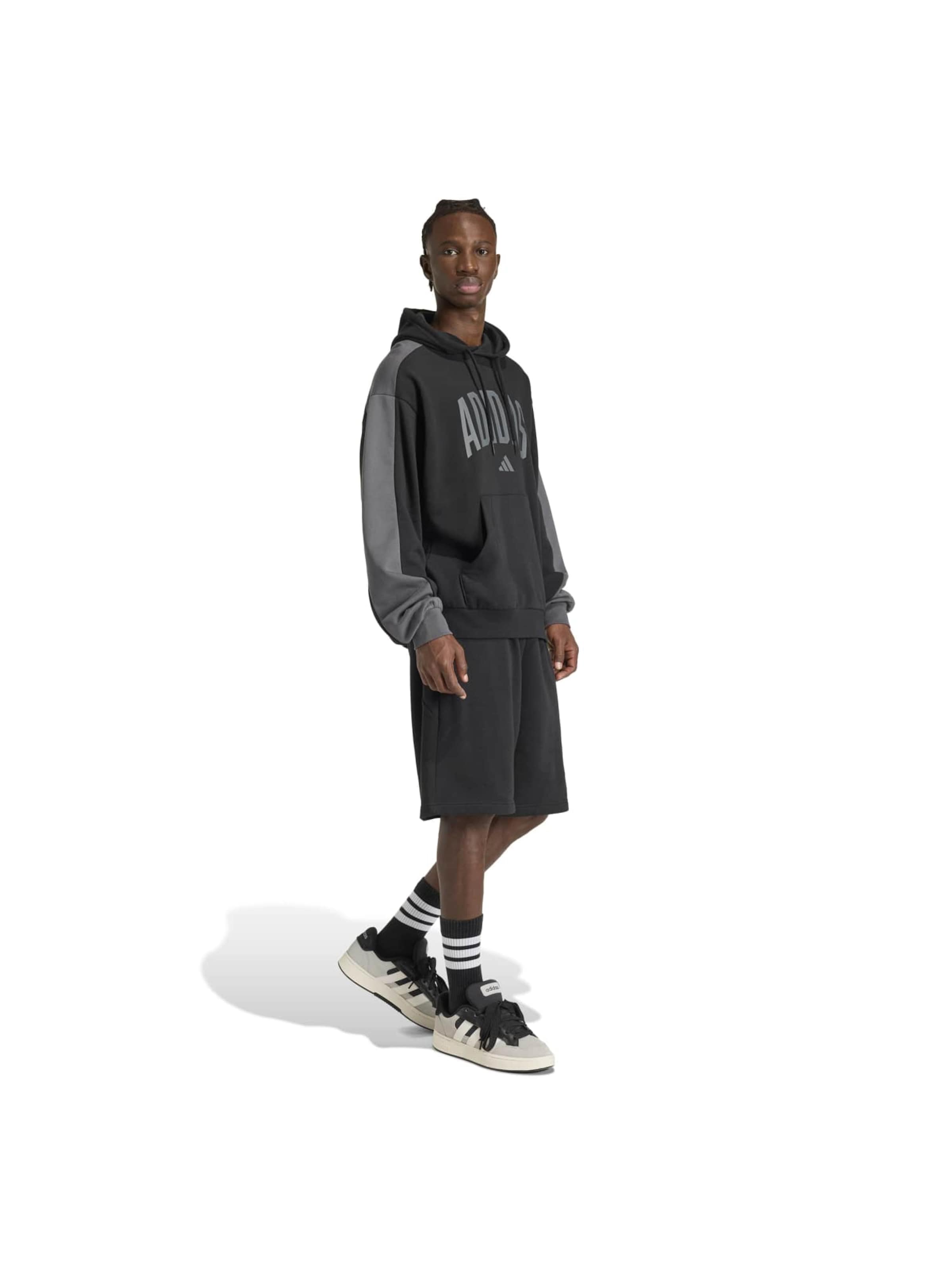 ADIDAS SPORTSWEAR Bő szár Sportnadrágok 'COLLEGIATE' - fekete