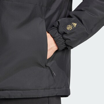 Veste de sport 'Manchester United Cultural Story' ADIDAS SPORTSWEAR en noir