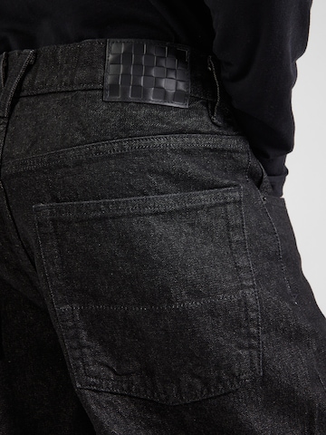 VANS Loosefit Farkut värissä musta
