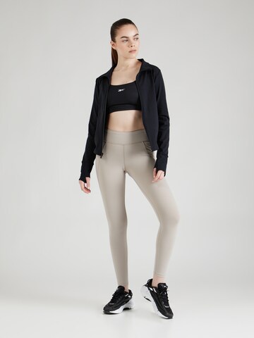 regular Pantaloni sportivi 'LUX' di Reebok in grigio