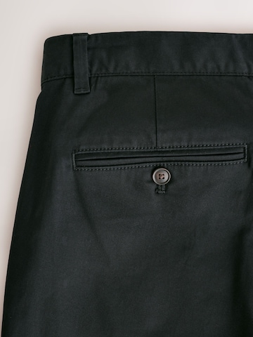 Next - Slimfit Pantalón chino en negro