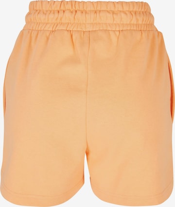 Karl Kani Normalny krój Spodnie w kolorze pomarańczowy