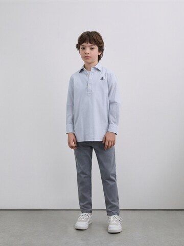 T-Shirt Scalpers en bleu : devant