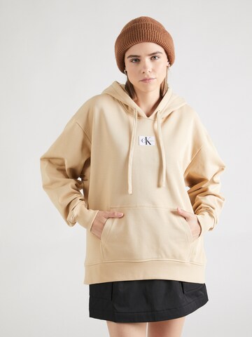 Sweat-shirt Calvin Klein Jeans en beige : devant