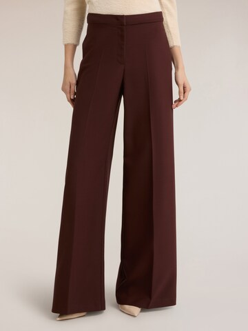 MOTIVI Wide leg Trousers in Brown: front