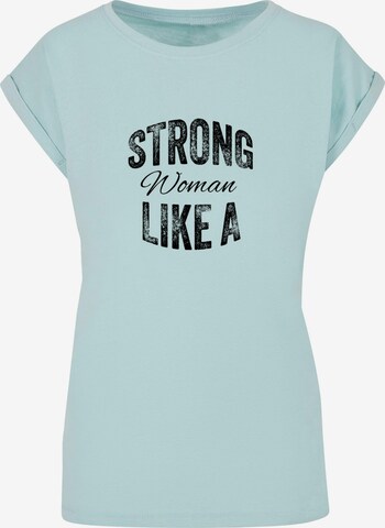 Merchcode T-Shirt 'WD - Strong Like A Woman' in Blau: predná strana