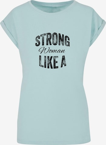 Merchcode Shirt 'WD - Strong Like A Woman' in Blauw: voorkant