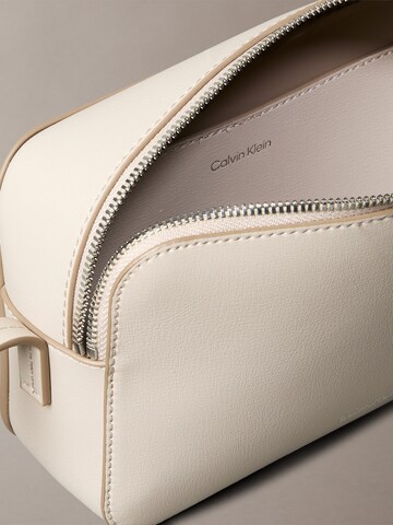 bēšs Calvin Klein Pleca soma