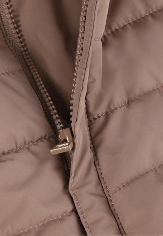Fixoni Overall värissä beige