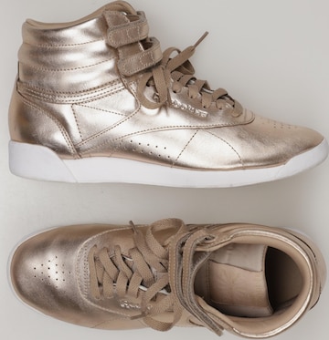 Reebok Sneakers & Trainers in 39 in Gold: front