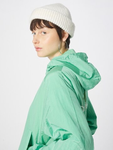 Calvin Klein Jeans Between-Season Jacket in Jade, Light Green | ABOUT YOU