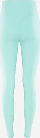 Skinny Pantaloni sportivi 'HWL117C' di Winshape in verde