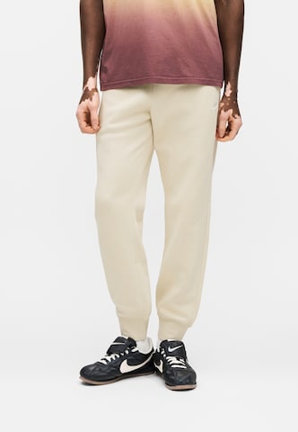 Nike Sportswear Tapered Trousers 'Club' in Beige: front