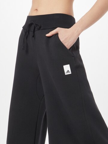 ADIDAS SPORTSWEAR Wide leg Παντελόνι φόρμας 'Lounge Fleece Wide' σε μαύρο