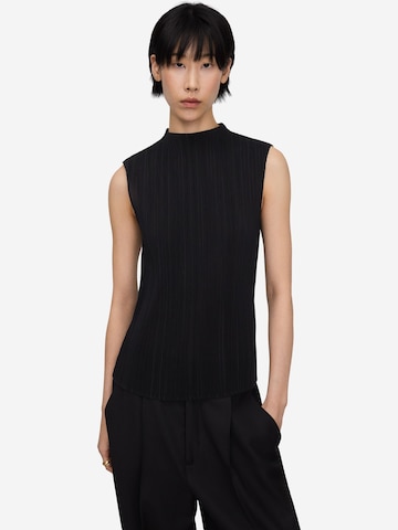 Haut Adolfo Dominguez en noir : devant