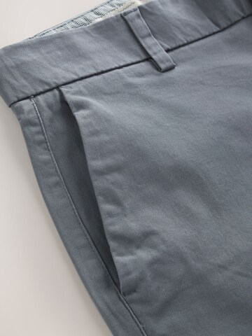Slimfit Pantaloni chino di Next in beige
