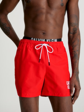 Calvin Klein Swimwear Board Shorts in Red: front