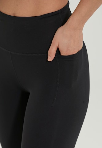 Athlecia Slim fit Workout Pants 'Douna' in Black