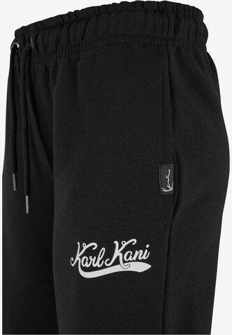 Wide leg Pantaloni di Karl Kani in nero