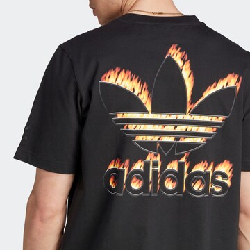 Maglietta 'Fire Trefoil' di ADIDAS ORIGINALS in nero