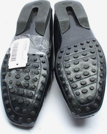 Tod's Flats & Loafers in 37 in Black