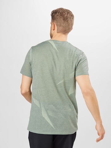 Reebok Функциональная футболка в Зеленый