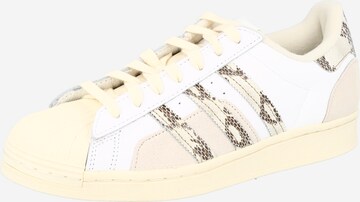 ADIDAS ORIGINALS Platform trainers in White: front