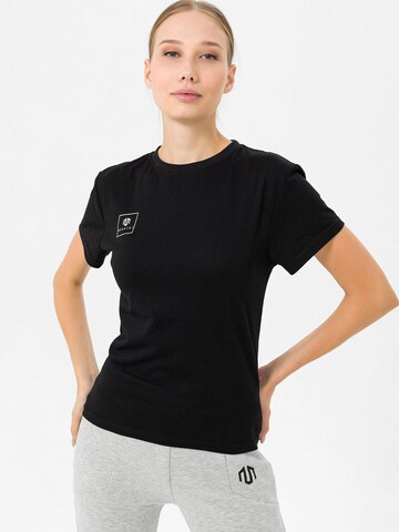 MOROTAI Performance Shirt 'Naka' in Black: front