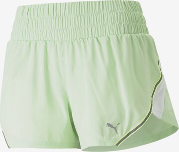 PUMA Regular Workout Pants in Green: front