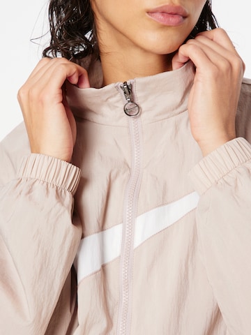 Veste mi-saison Nike Sportswear en beige