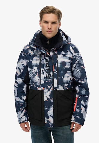 Veste fonctionnelle Superdry en bleu : devant
