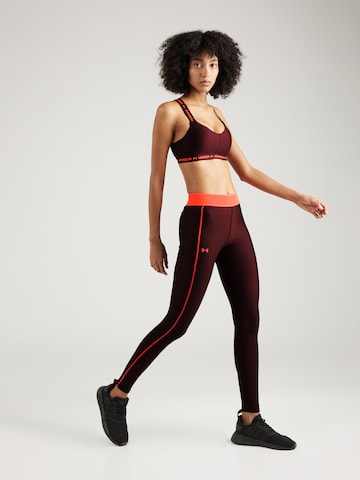 Skinny Pantaloni sportivi di UNDER ARMOUR in rosso