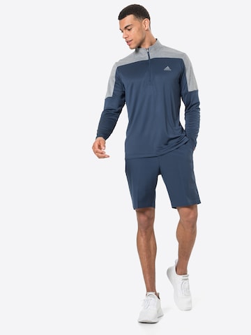 ADIDAS GOLF - Sweatshirt de desporto em azul