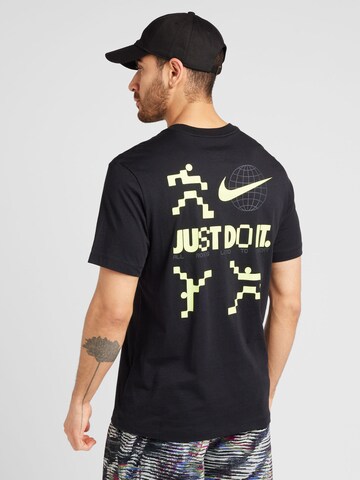 T-Shirt Nike Sportswear en noir : devant