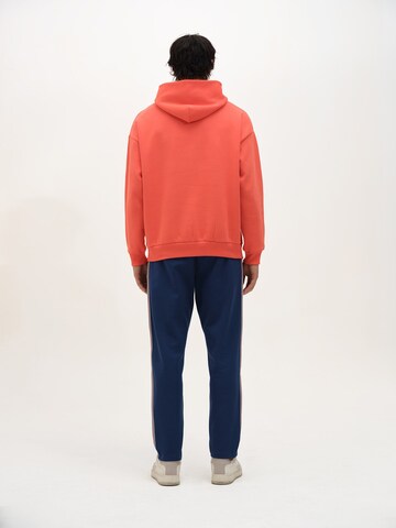 Rockupy Sweatshirt 'Yadriel'‌‌‌‌‌ in Orange