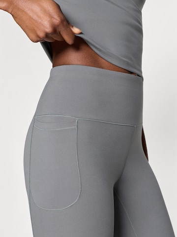 UNDER ARMOUR Skinny Sporthose 'Motion' in Grün