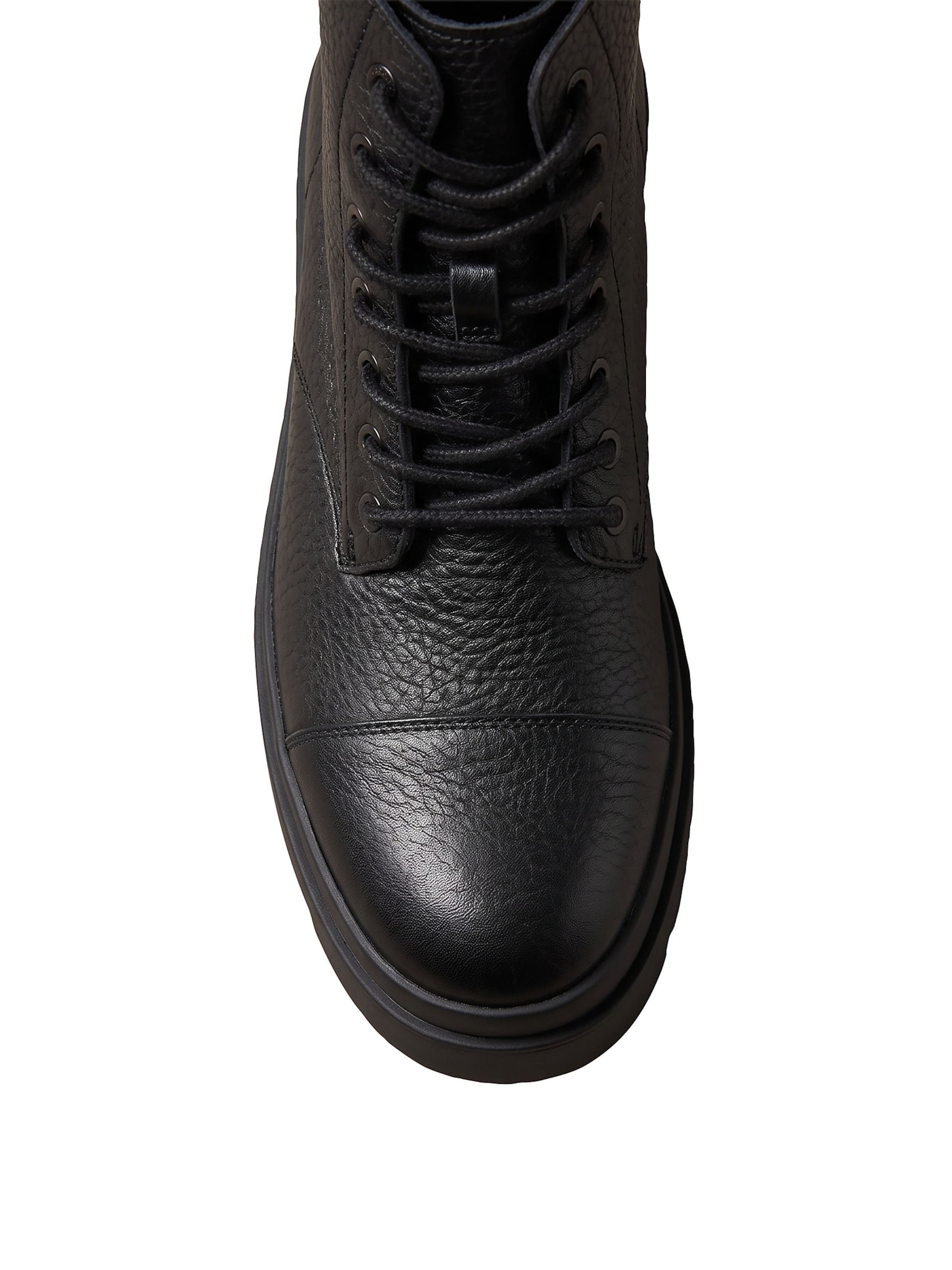 Calvin Klein Lace-Up Boots in Black
