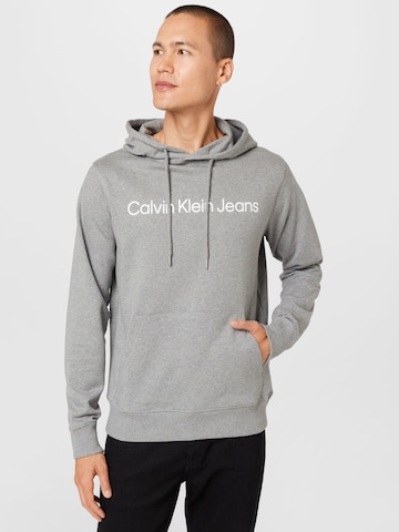 Sweat-shirt Calvin Klein Jeans en gris : devant